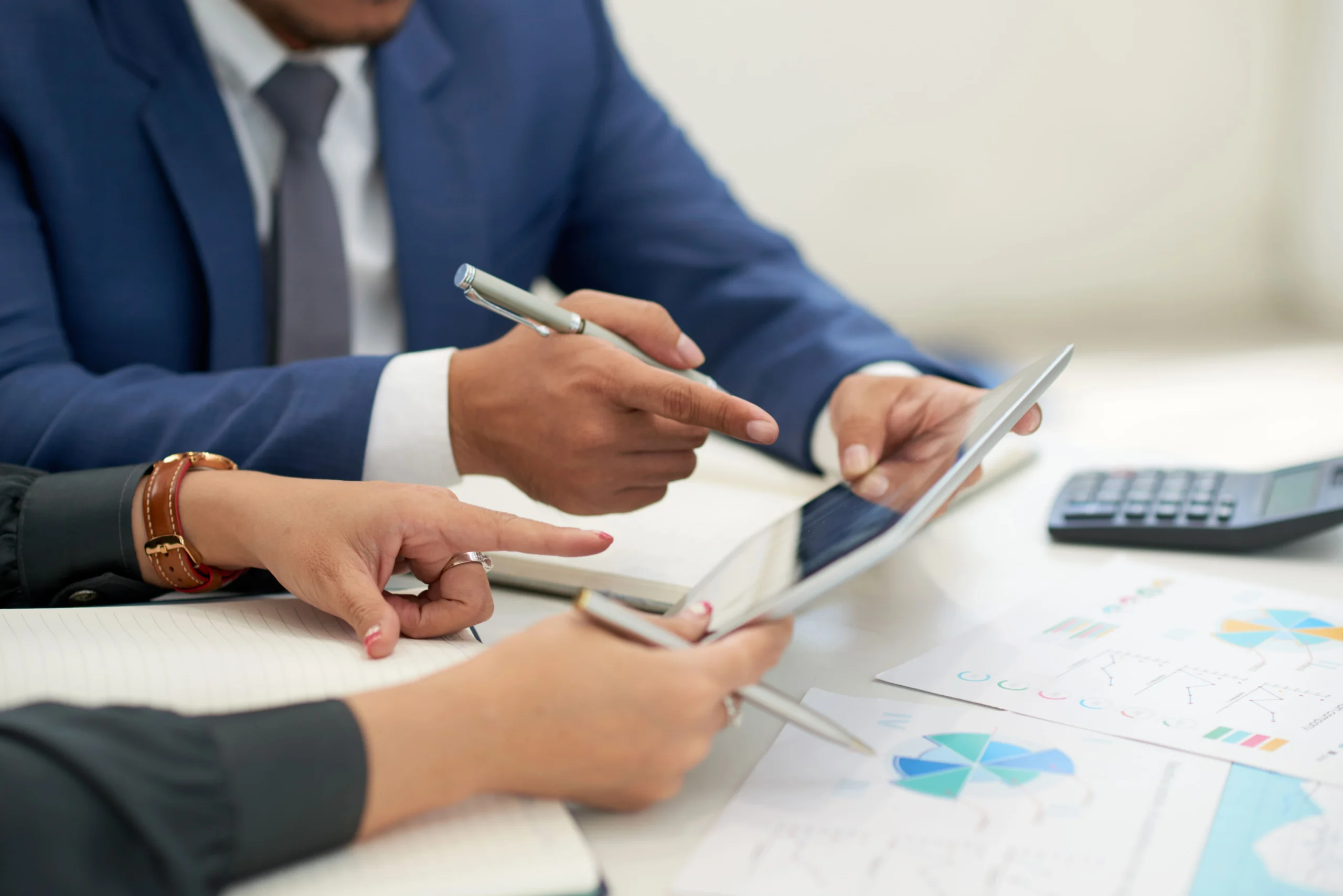 Close-up of financial documents and spreadsheets, representing Wio Accounting’s detail-oriented bookkeeping and financial record-keeping services.