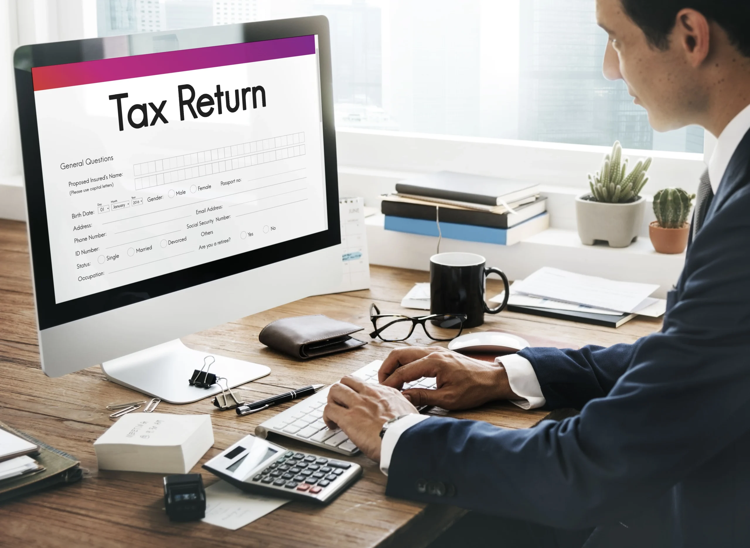 Corporate tax accountant analyzing financial statements, representing Wio Accounting’s expert tax planning and filing services for businesses in British Columbia.