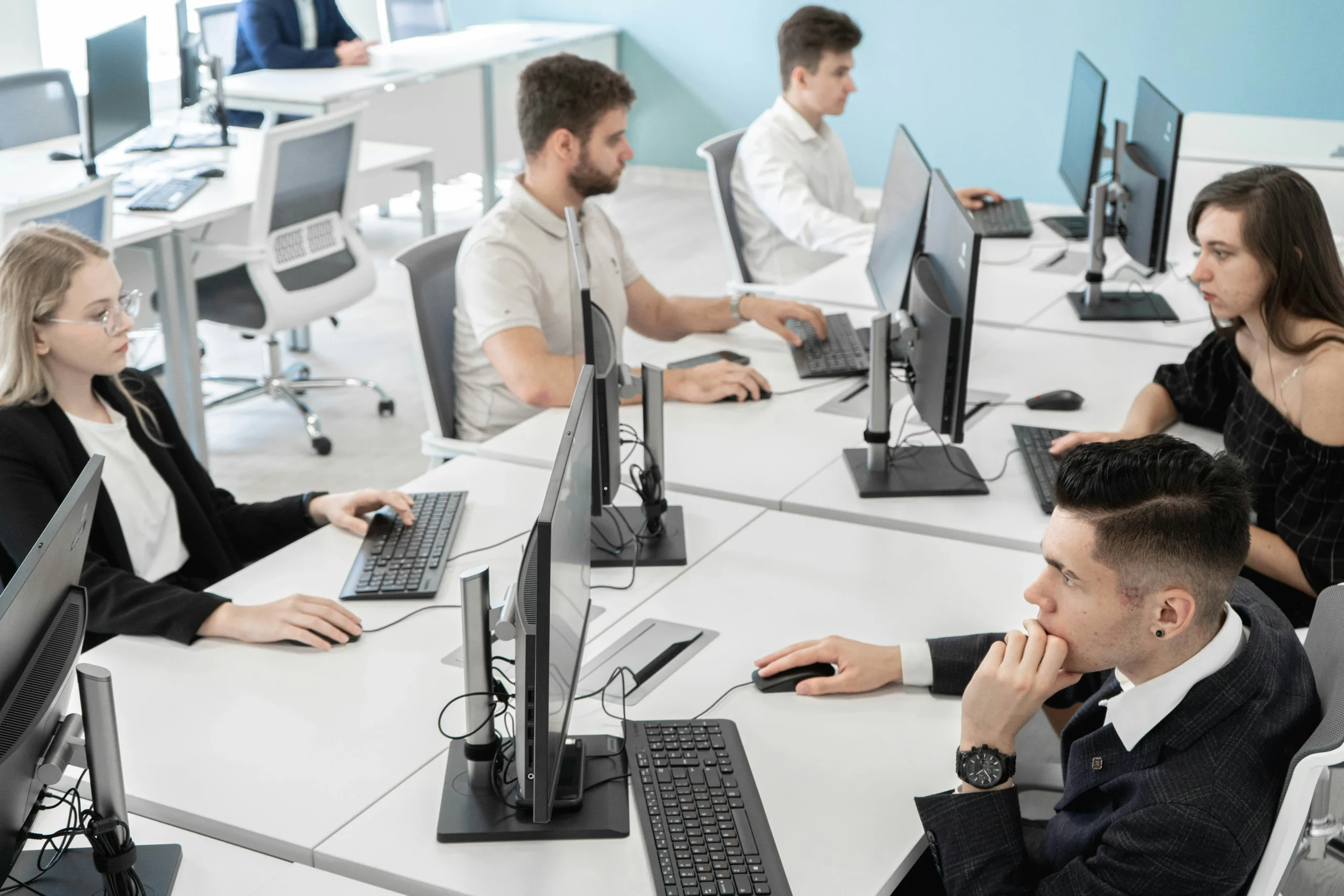 Payroll specialist reviewing employee records and salary data, representing Wio Accounting’s accurate and compliant payroll processing services in British Columbia.